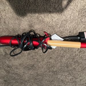 Chi rotating curler with infra texture hairspray